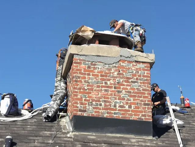 Carson Chimney Sweep installing a custom chimney crown in Carson, CA